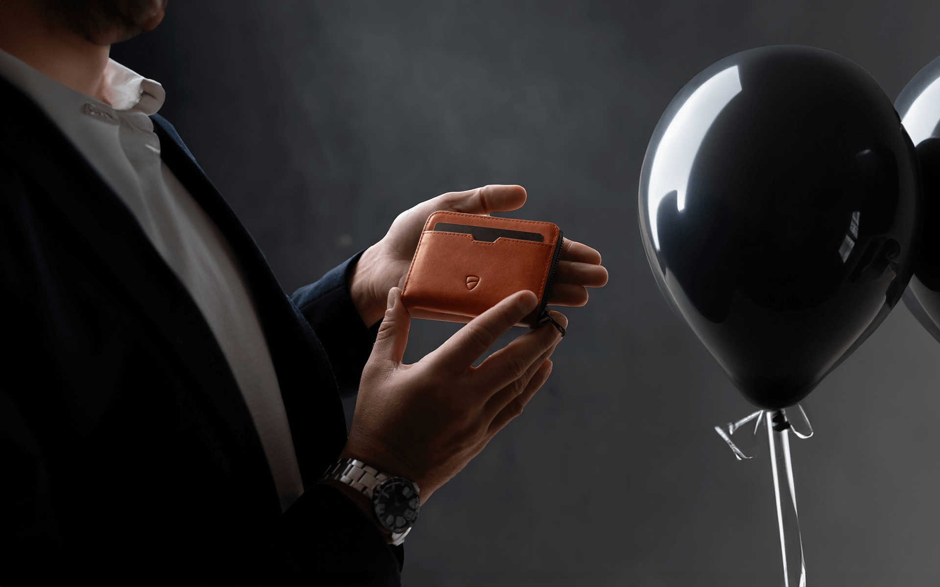 Vaultskin MAYFAIR Cognac Pouch in Hands